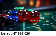 Red dice rest amidst a vibrant assortment of chips as players engage in an exciting game at a casino during the evening hours. Стоковое AI-изображение, AI-художник Данила Большаков / Фотобанк Лори