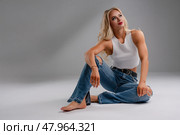 Fitness lover flaunting confidence in chic lingerie while exercising. Стоковое фото, фотограф Гурьянов Андрей / Фотобанк Лори