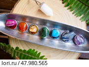 seven chakras stones, energy healing concept. Стоковое фото, фотограф Anastasy Yarmolovich / Фотобанк Лори