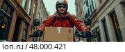 A delivery rider in a red jacket and helmet rides a motorcycle through a snowy urban area, skillfully handling a box on the handlebars. Стоковое AI-изображение, AI-художник Данила Большаков / Фотобанк Лори