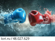 two boxing gloves clashing in a test. Стоковое фото, фотограф Anastasy Yarmolovich / Фотобанк Лори