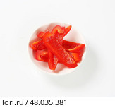 Slices of red bell pepper. Стоковое фото, фотограф Alena Dvorakova / PantherMedia / Фотобанк Лори