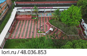 Drone Aerial View of Universidad del Valle, Pacific Campus in Buenaventura, Colombia. Редакционное видео, видеограф ALEJANDRO PEREZ ALVARES / Фотобанк Лори