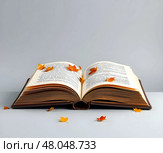 Книга и листья. Стоковое AI-изображение, AI-художник Boostport / Фотобанк Лори