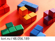 wooden construction kit. fine motor skills, early development. everyday children games. Стоковое фото, фотограф Есич Елена / Фотобанк Лори