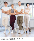 Young dancers imitating dance of Little Swans pose in studio. Стоковое фото, фотограф Яков Филимонов / Фотобанк Лори