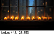 wdow candles in the dark ai generated. Стоковое AI-изображение, AI-художник Vectorwin / Фотобанк Лори