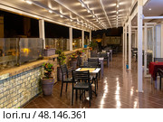 Terrace of a Moroccan restaurant in a modern style at night. Редакционное фото, фотограф Евгений Ткачёв / Фотобанк Лори