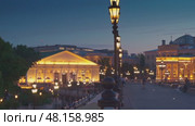 Moscow, RUSSIA - Aug 04 2021, 4k: Panoramic night view on Moscow Manege from Manezhnaya Square, on Aug 04, 2021 in Moscow, Russia. Редакционное видео, видеограф Сергей Богомяко / Фотобанк Лори