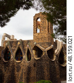 Exterior view of guell crypt, masterpiece gaudi architecture located at catalunya outside town. Стоковое фото, фотограф Яков Филимонов / Фотобанк Лори