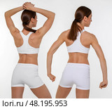 Back view young athletic brunette woman in white sportwear. Стоковое фото, фотограф Андрей Аркуша / Фотобанк Лори