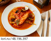 Monkfish tail in spicy sauce with shrimp and mussels. Стоковое фото, фотограф Яков Филимонов / Фотобанк Лори