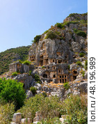 Ruins of ancient Lycian necropolis with rock-cut tombs in Demre. Стоковое фото, фотограф Яков Филимонов / Фотобанк Лори