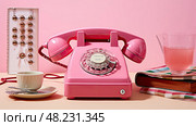 corded phone pink ai generated. Стоковое AI-изображение, AI-художник Vectorwin / Фотобанк Лори