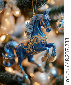 A blue horse ornament hangs on a Christmas tree. Стоковое AI-изображение, AI-художник Ярославский Максим / Фотобанк Лори