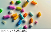 Colorful assortment of pills on a white background. Стоковое AI-видео, аниматор Sergey Grishin / Фотобанк Лори