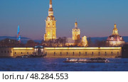 Saint Petersburg, Russia - May 9 2025, 4k, Panoramic view from Neva River to Peter and Paul Fortress, in background a Lakhta Centre skyscraper with illumination, at sunset, St Petersburg, Russia. Стоковое видео, видеограф Сергей Богомяко / Фотобанк Лори