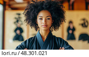 Portrait of a Confident Woman in Black Kimono. Стоковое AI-изображение, AI-художник Данила Большаков / Фотобанк Лори