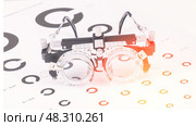 Optometry glasses on table. Стоковое фото, фотограф Скрипачев Антон / Фотобанк Лори