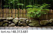 japanese bamboo fence ai generated. Стоковое AI-изображение, AI-художник Vectorwin / Фотобанк Лори