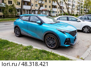 GAC GS3 subcompact crossover parked in city street. Front side view. Редакционное фото, фотограф Константин Григорьев / Фотобанк Лори