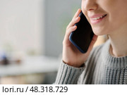 Cheerful Young Manager Talking On Phone. Стоковое фото, фотограф Dmitriy Shironosov / PantherMedia / Фотобанк Лори