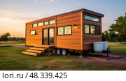wheels modern tiny house ai generated. Стоковое AI-изображение, AI-художник Vectorwin / Фотобанк Лори
