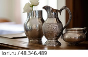 tarnished pitcher water ai generated. Стоковое AI-изображение, AI-художник Vectorwin / Фотобанк Лори
