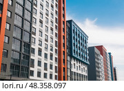 Modern apartment buildings in the city. Multicolored facades of modern buildings. Стоковое фото, фотограф Евгений Харитонов / Фотобанк Лори
