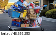 toys shopping cart with gifts ai generated. Стоковое AI-изображение, AI-художник Vectorwin / Фотобанк Лори
