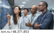 Team of it engineers monitoring network traffic on big screen display. Стоковое AI-видео, аниматор Юрий Поздников / Фотобанк Лори