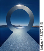 Stunning Coastline View Through a Large Circular Structure Beside a Sparkling Sea at Midday. Стоковое AI-изображение, AI-художник Юлия Гапеенко / Фотобанк Лори