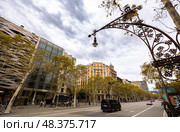 Barcelona, Spain - September 03, 2023: Picturesque avenue Paseo de Gracia in center of Barcelona in autumn in Eixample district. Редакционное фото, фотограф Яков Филимонов / Фотобанк Лори