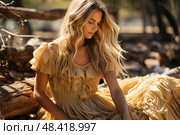 Serenity woman in a stunning yellow dress sitting gracefully atop a stack of logs in a scenic natural setting. Стоковое AI-изображение, AI-художник Данила Большаков / Фотобанк Лори