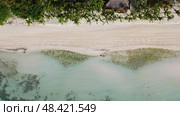 Aerial top view of beautiful tropical sandy beach. Стоковое фото, фотограф Михаил Коханчиков / Фотобанк Лори
