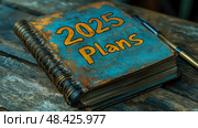 A colorful journal marked 2025 Plans sits open on a rustic wooden table with a pen nearby, symbolizing upcoming goals and ambitions. Стоковое AI-изображение, AI-художник Данила Большаков / Фотобанк Лори
