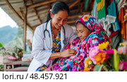 Compassionate care: a doctor examining a patient with floral textile in a rural setting. Healthcare service concept for awareness, compassion, support. Стоковое AI-изображение, AI-художник Данила Большаков / Фотобанк Лори