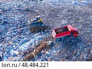 Top view of a huge dump of toxic and household waste. The problem of environmental pollution. Стоковое фото, фотограф Евгений Ткачёв / Фотобанк Лори
