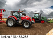 Kaliningrad, RUSSIA - July 29, 2022: Agricultural Exhibition. Agricultural machinery. Редакционное фото, фотограф Ольга Сейфутдинова / Фотобанк Лори