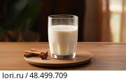 garnish glass of soymilk ai generated. Стоковое AI-изображение, AI-художник Vectorwin / Фотобанк Лори