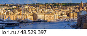 VALLETTA, MALTA - NOVEMBER 12, 2018 - The Grand Harbor Tricity bay, Birgu and Senglea islands with ships and boats in the port. Редакционное фото, фотограф Сергей Богомяко / Фотобанк Лори