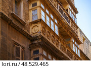 Typical Maltese covered balconies in Valetta, Malta (2018 год). Стоковое фото, фотограф Сергей Богомяко / Фотобанк Лори