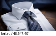 pressed white shirt tie ai generated. Стоковое AI-изображение, AI-художник Vectorwin / Фотобанк Лори