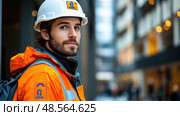 A man dressed in bright safety attire and hard hat poses confidently in a contemporary building under construction. Стоковое AI-изображение, AI-художник Данила Большаков / Фотобанк Лори