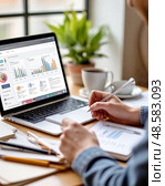 A man businessman while working in the company's office. Work with Laptop and documents. Стоковое AI-изображение, AI-художник Сергей Елизарьев / Фотобанк Лори