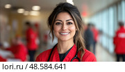 A smiling healthcare worker in a red uniform stands confidently in a busy hospital corridor, surrounded by colleagues and patients. Стоковое AI-изображение, AI-художник Данила Большаков / Фотобанк Лори