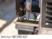Repair of a large boiler gas burner, analysis of parts: servo motor and air supply regulator (2019 год). Редакционное фото, фотограф ok_fotoday / Фотобанк Лори