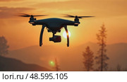 A wildfire observation drone flying among forest trees bound by flame. Стоковое AI-видео, аниматор Sergey Grishin / Фотобанк Лори