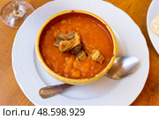 Portion of patatas meneas served in bowl. Стоковое фото, фотограф Яков Филимонов / Фотобанк Лори