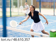woman participates in a paddle tennis tournament. Стоковое фото, фотограф Яков Филимонов / Фотобанк Лори